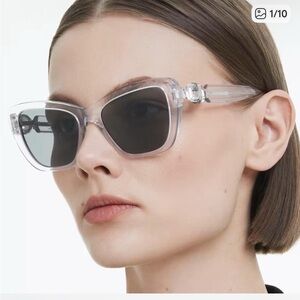 Swarovski Clear Frame Sunglasses with Black Lenses
